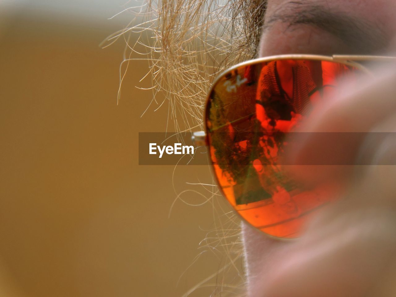 Cropped image of woman wearing sunglasses