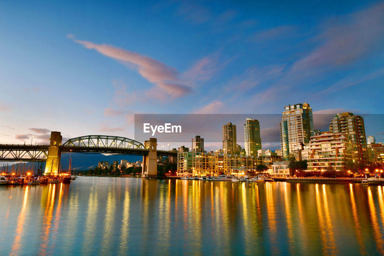 Beautiful view of vancouver skyline with harbor at sunset, british columbia, canada