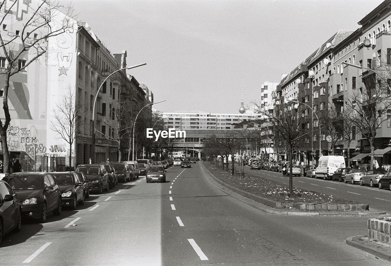 Street in city against sky