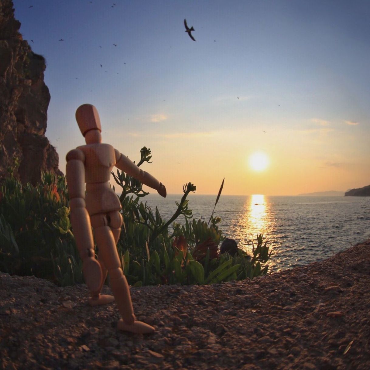 Artist's figure on beach