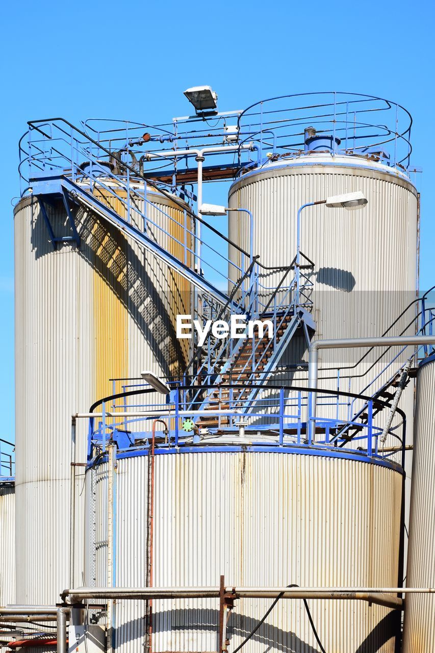 Low angle view of metallic structure against sky