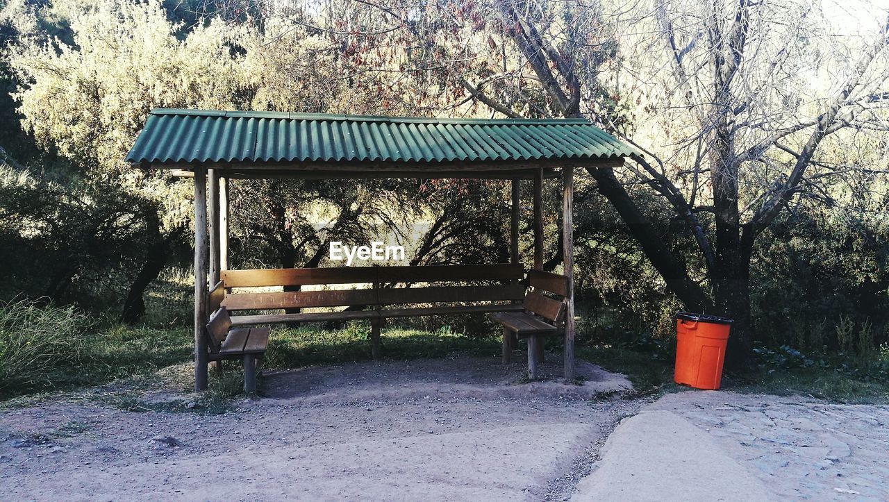 EMPTY PARK AGAINST TREES