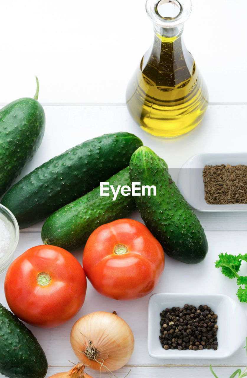 High angle view of vegetables with spices on table