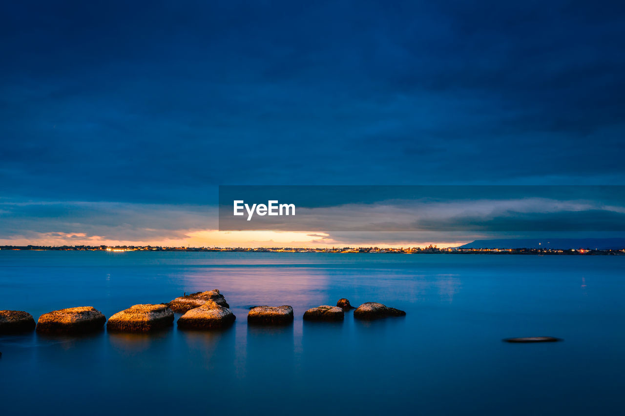 Long exposure to the sea at sunset