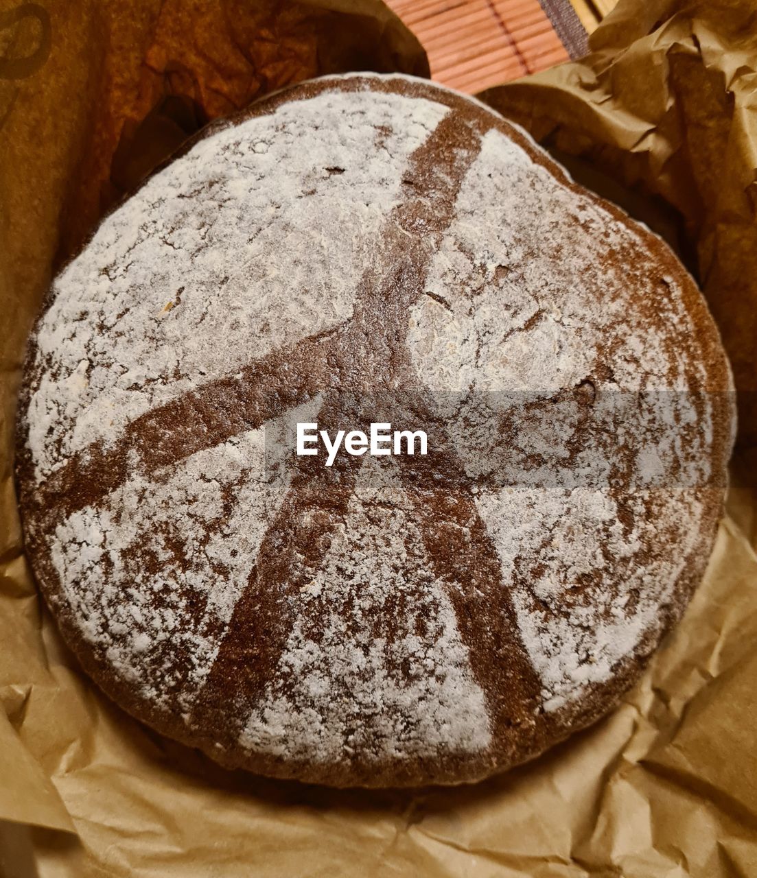food, powdered sugar, baked, food and drink, rye bread, sourdough, bread, indoors, no people, close-up, still life, whole grain, freshness, brown bread, dessert, high angle view, soda bread, loaf of bread, brown, healthy eating