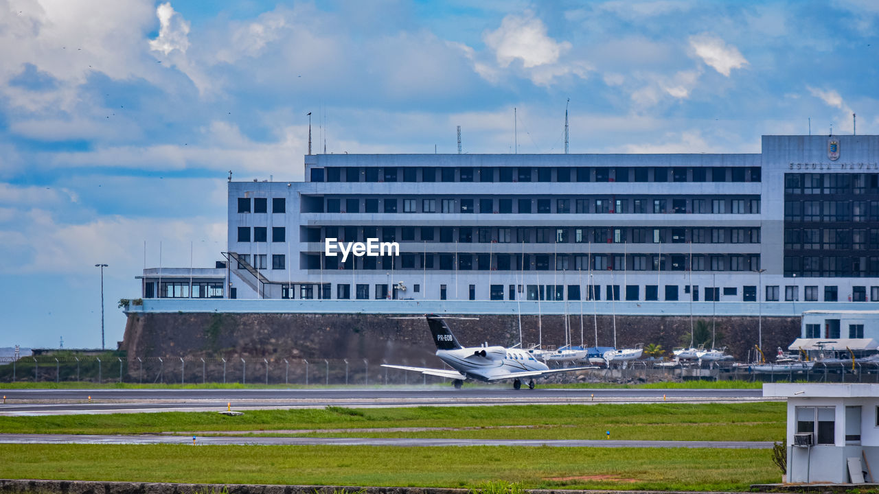 Brazilian commercial plane taxiing on the runway at santos dumont national airport