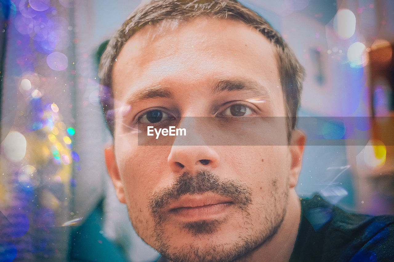 Close-up portrait of handsome man
