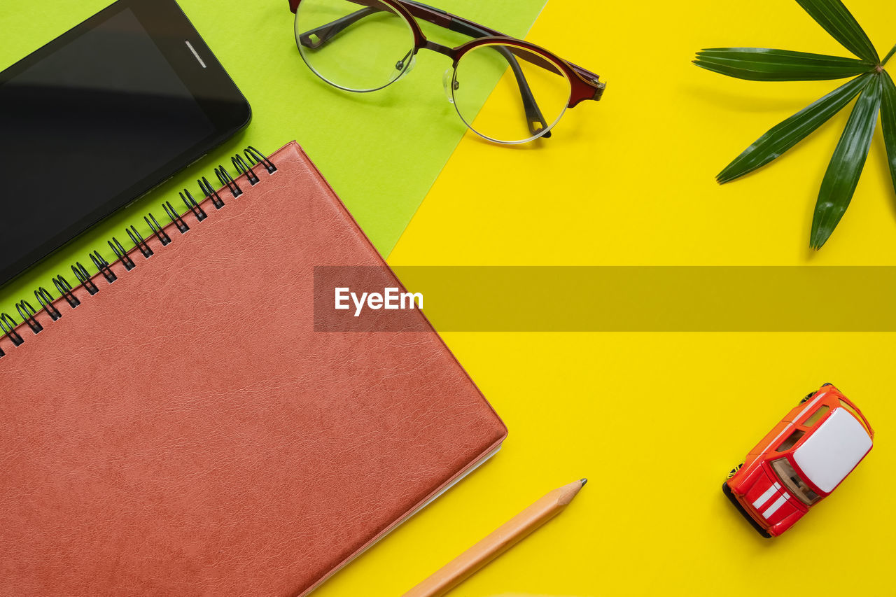 High angle view of office supplies on table