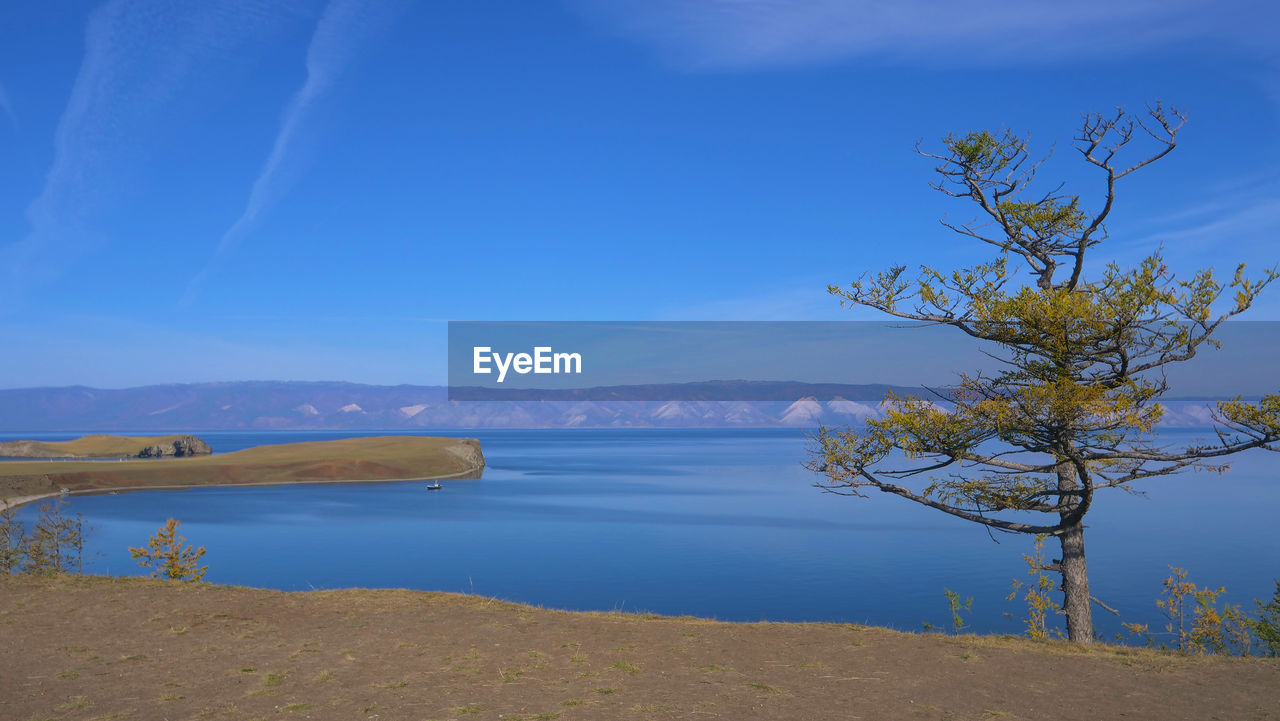 SCENIC VIEW OF SEA AGAINST BLUE SKY