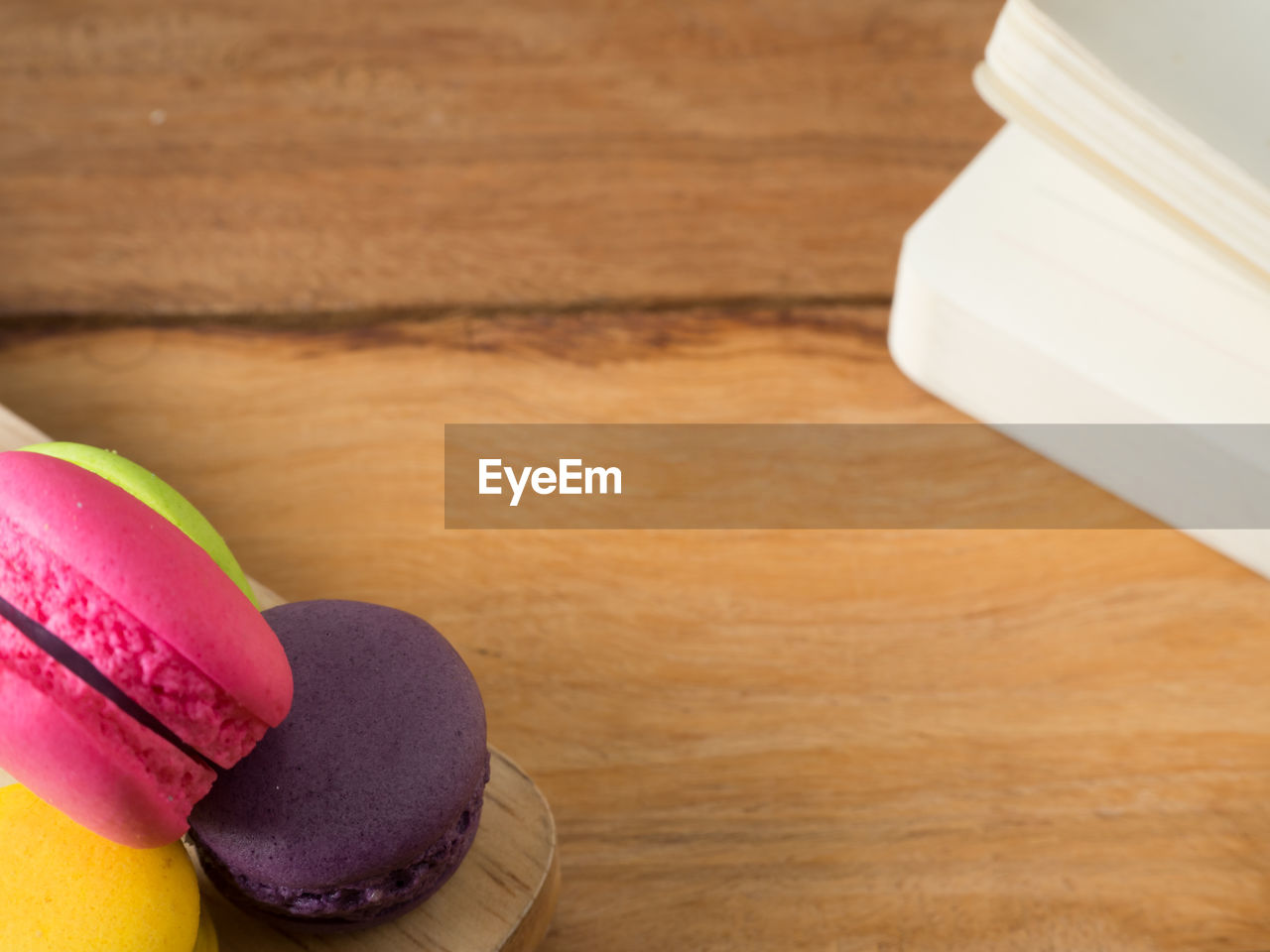 Close-up of macaroons on wooden table