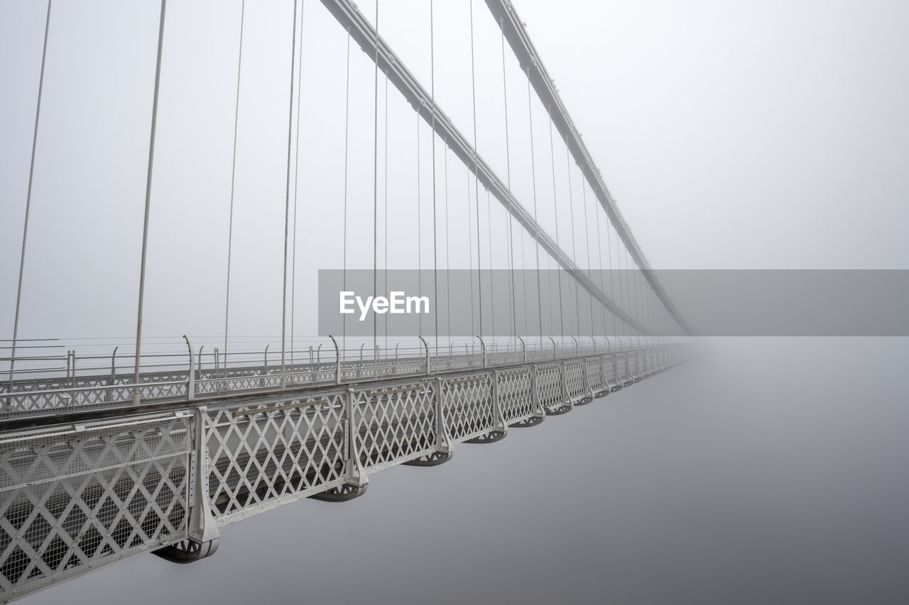 Suspension bridge in foggy weather