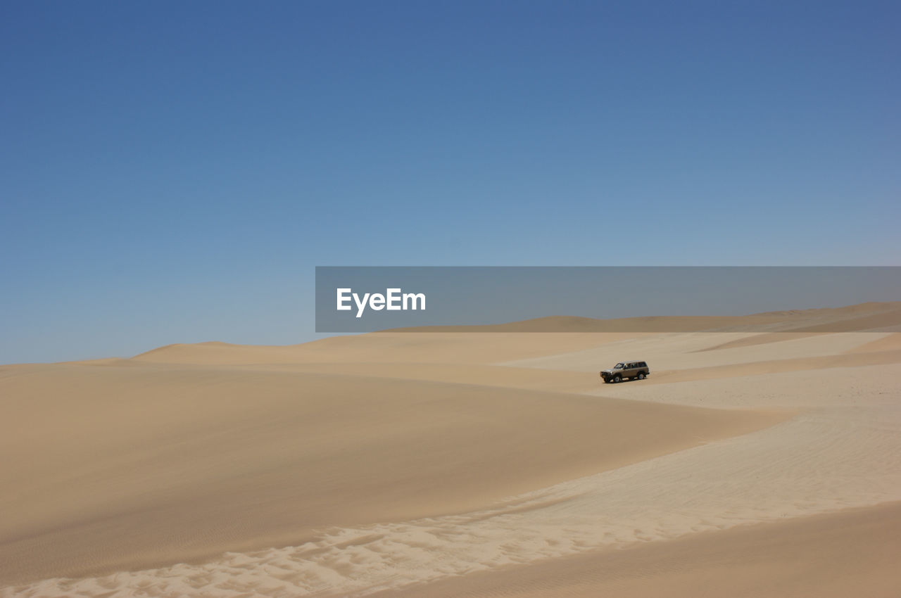 VIEW OF DESERT AGAINST CLEAR SKY
