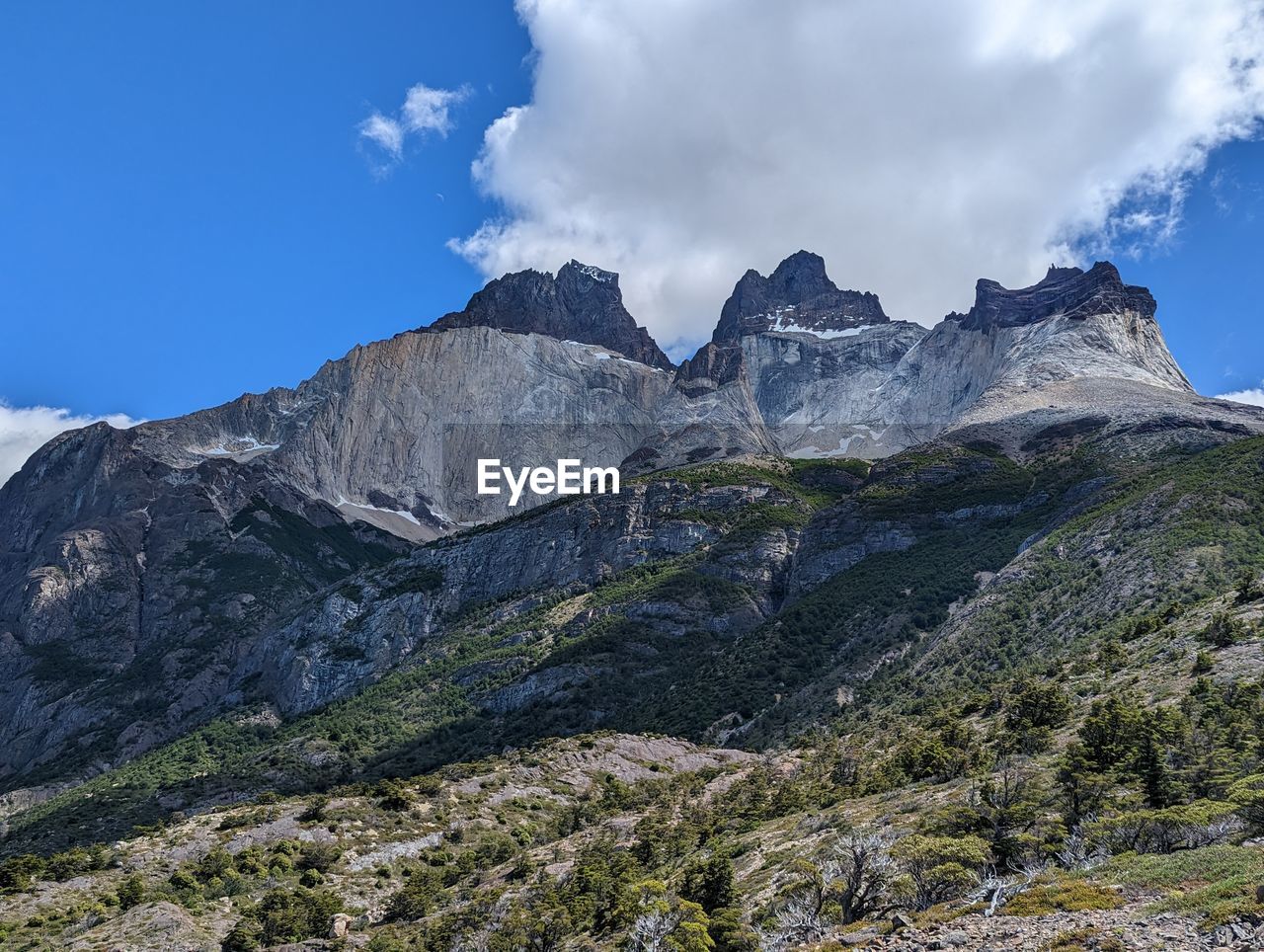 panoramic view of rocky mountains against sky