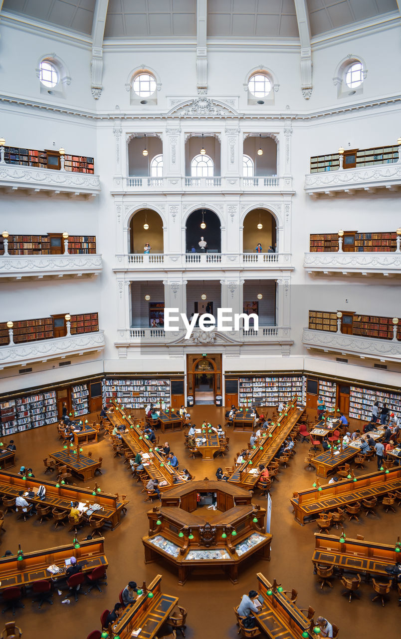 HIGH ANGLE VIEW OF BOOKS IN BUILDING