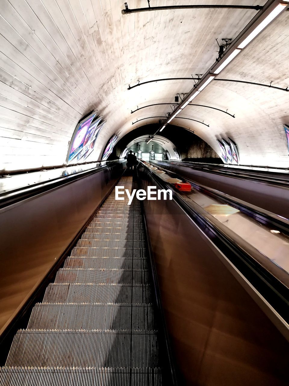 ESCALATOR IN SUBWAY STATION