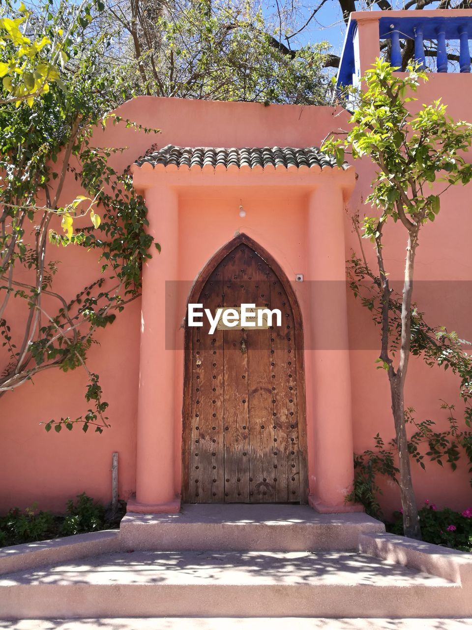 ENTRANCE TO BUILDING WITH OPEN DOOR