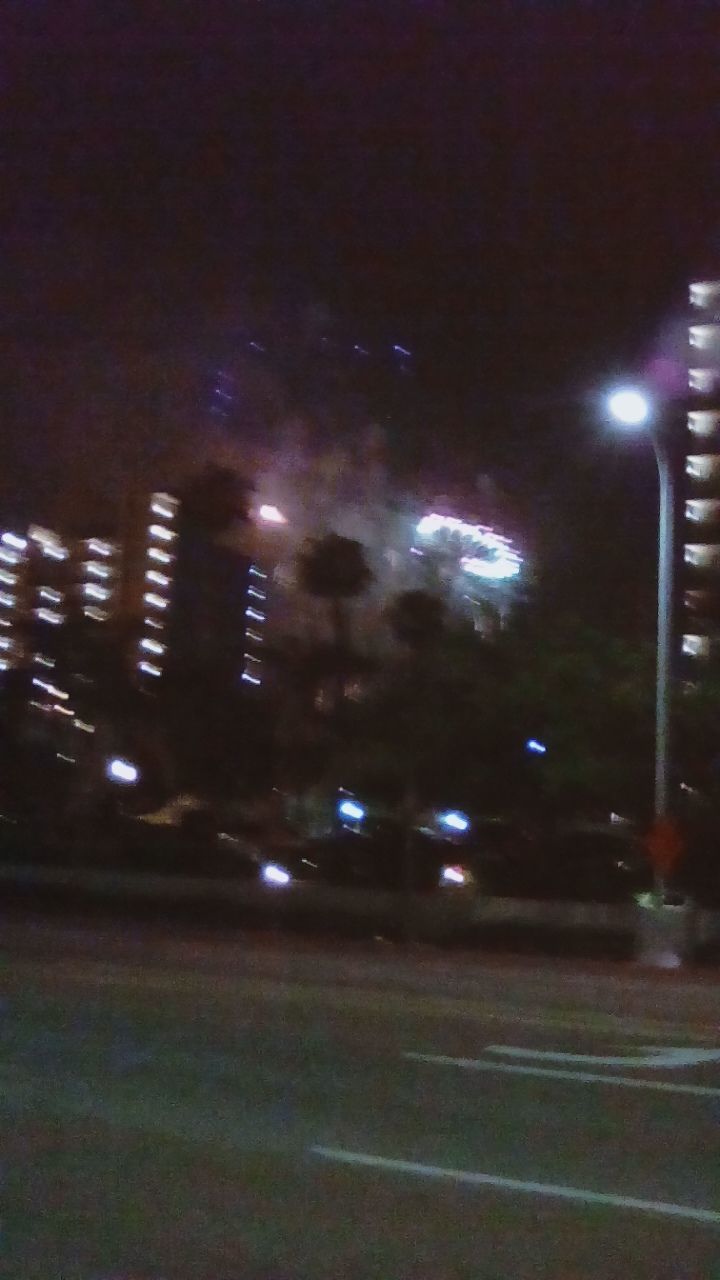 BLURRED MOTION OF CAR ON ROAD AT NIGHT
