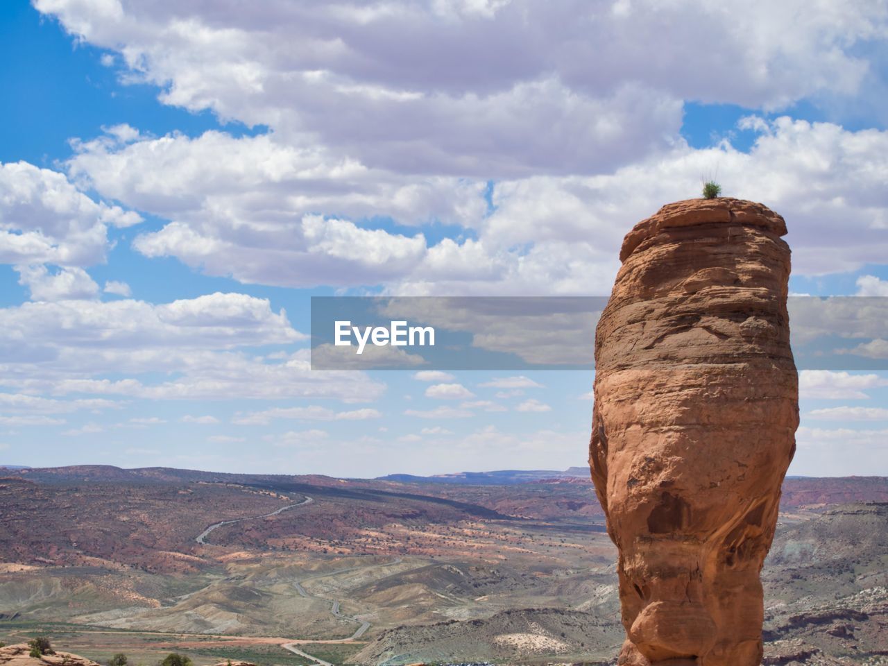 Rock formations on landscape against sky