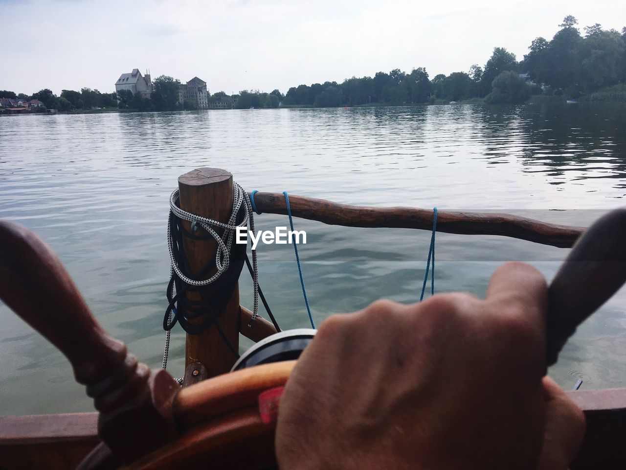 MIDSECTION OF MAN IN LAKE