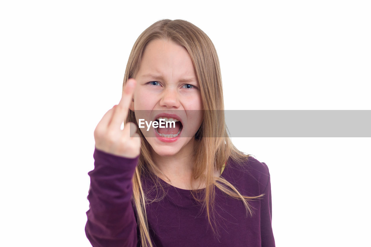 PORTRAIT OF A GIRL WITH WHITE BACKGROUND