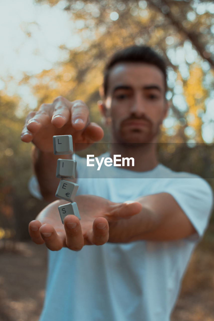 Young man showing art of levitation