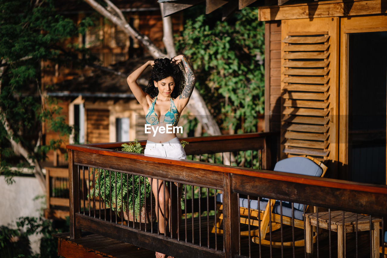 Woman on hotel balcony 