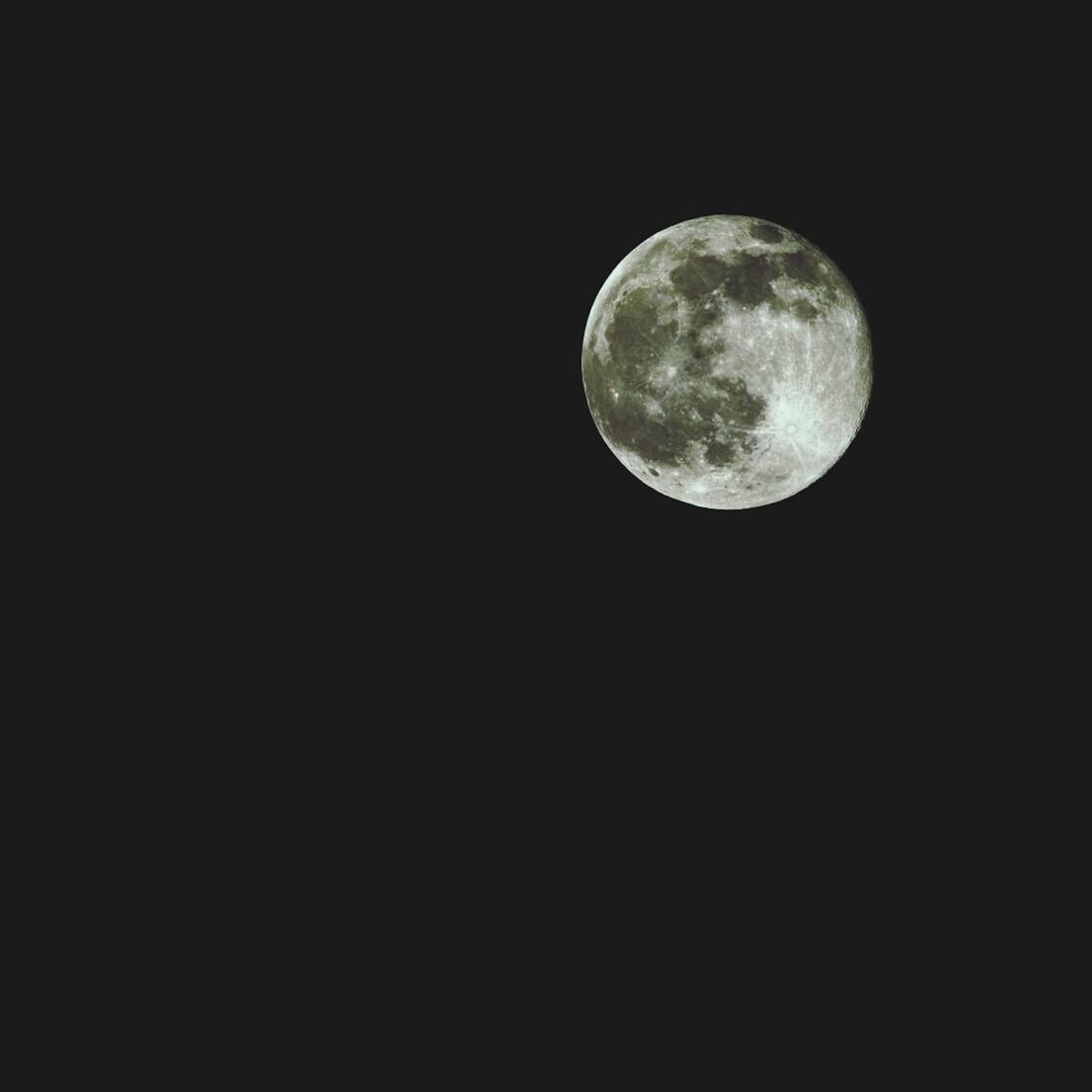 Idyllic view of full moon at night