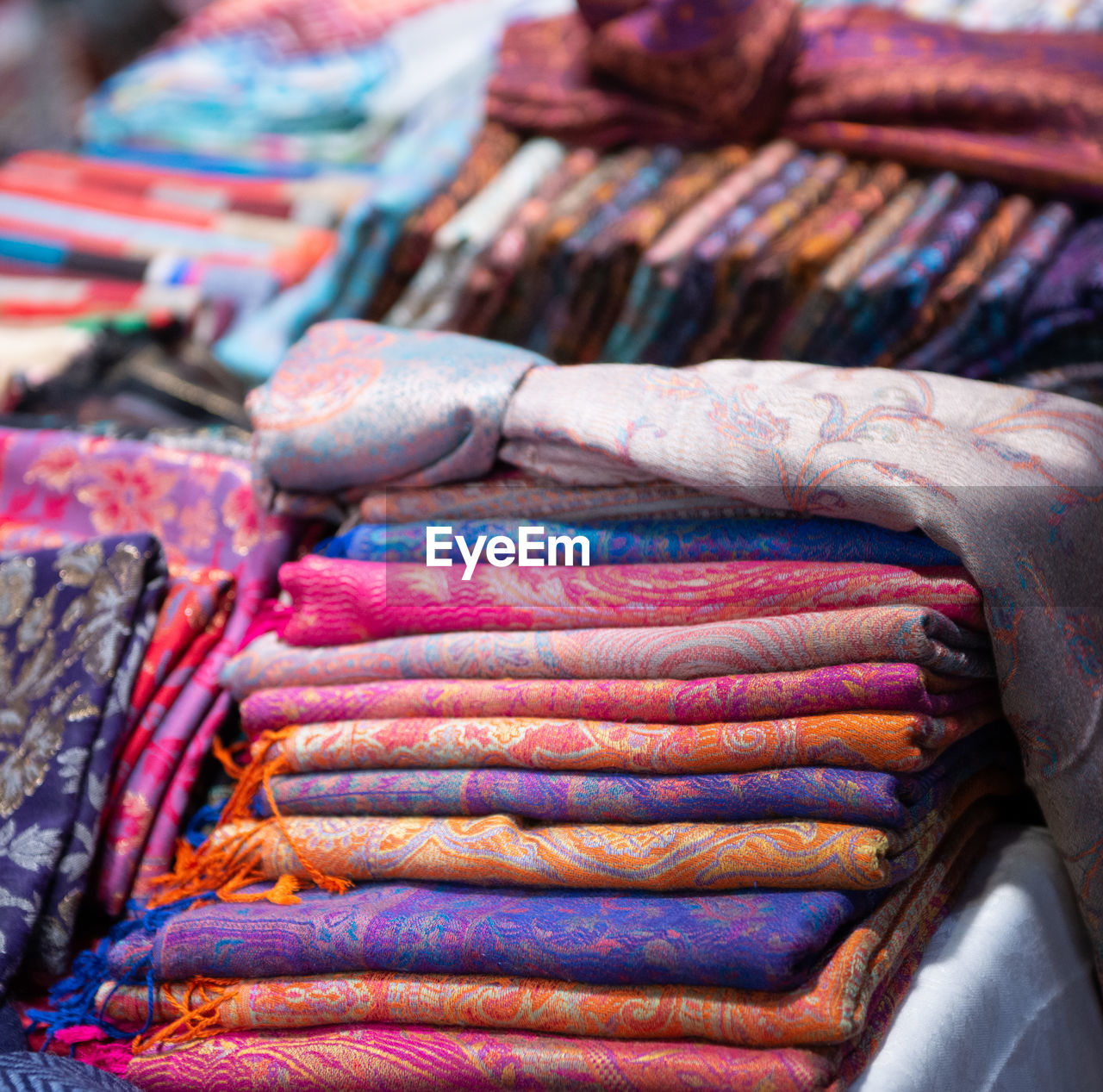 multi colored, textile, market, retail, business finance and industry, variation, large group of objects, no people, abundance, business, for sale, market stall, art, clothing, industry, textile industry, close-up, store, focus on foreground, thread, wool, small business, sale, day