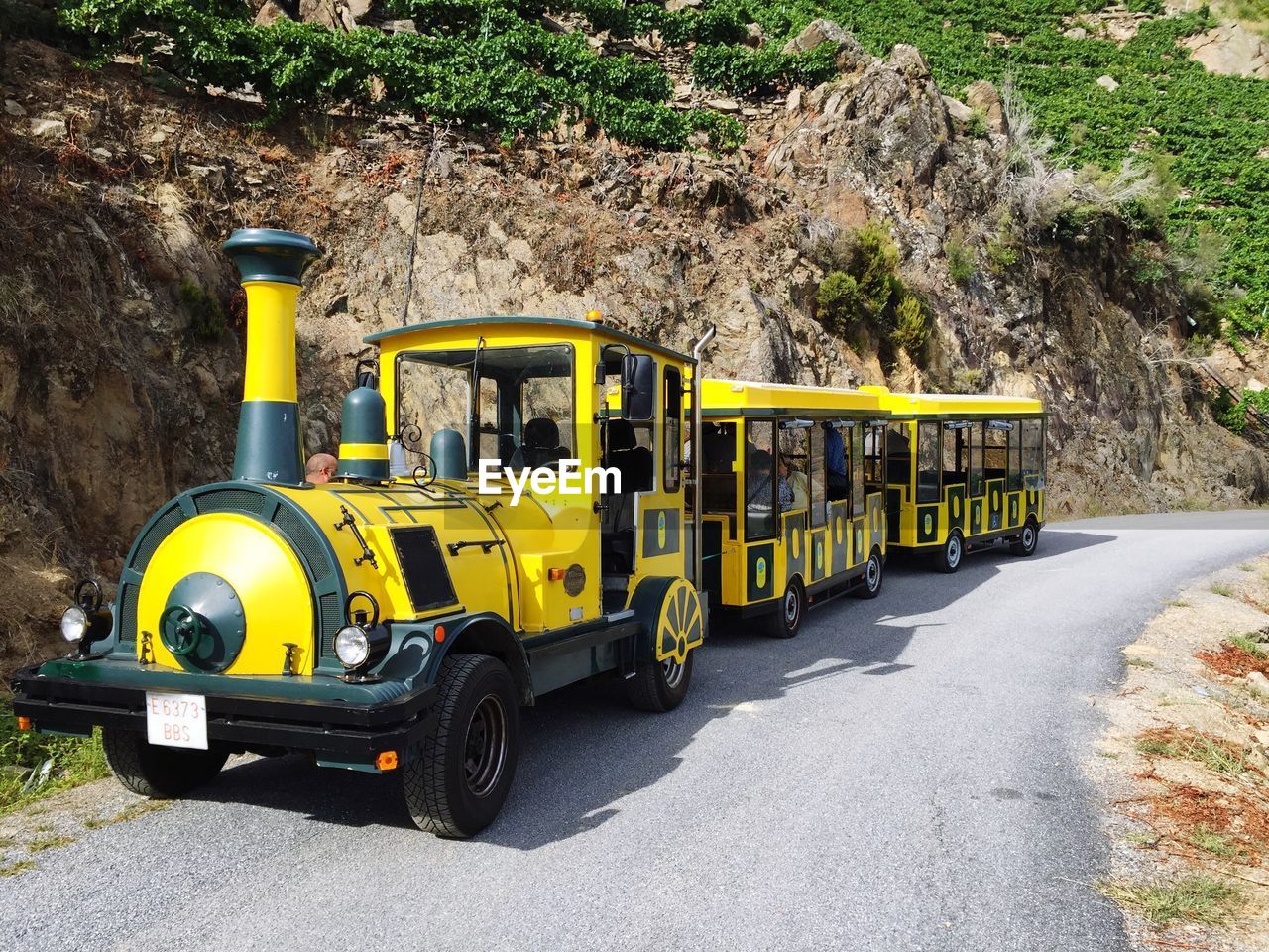 Miniature train on road