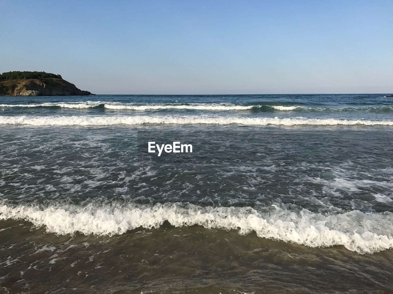 Scenic view of sea against clear sky