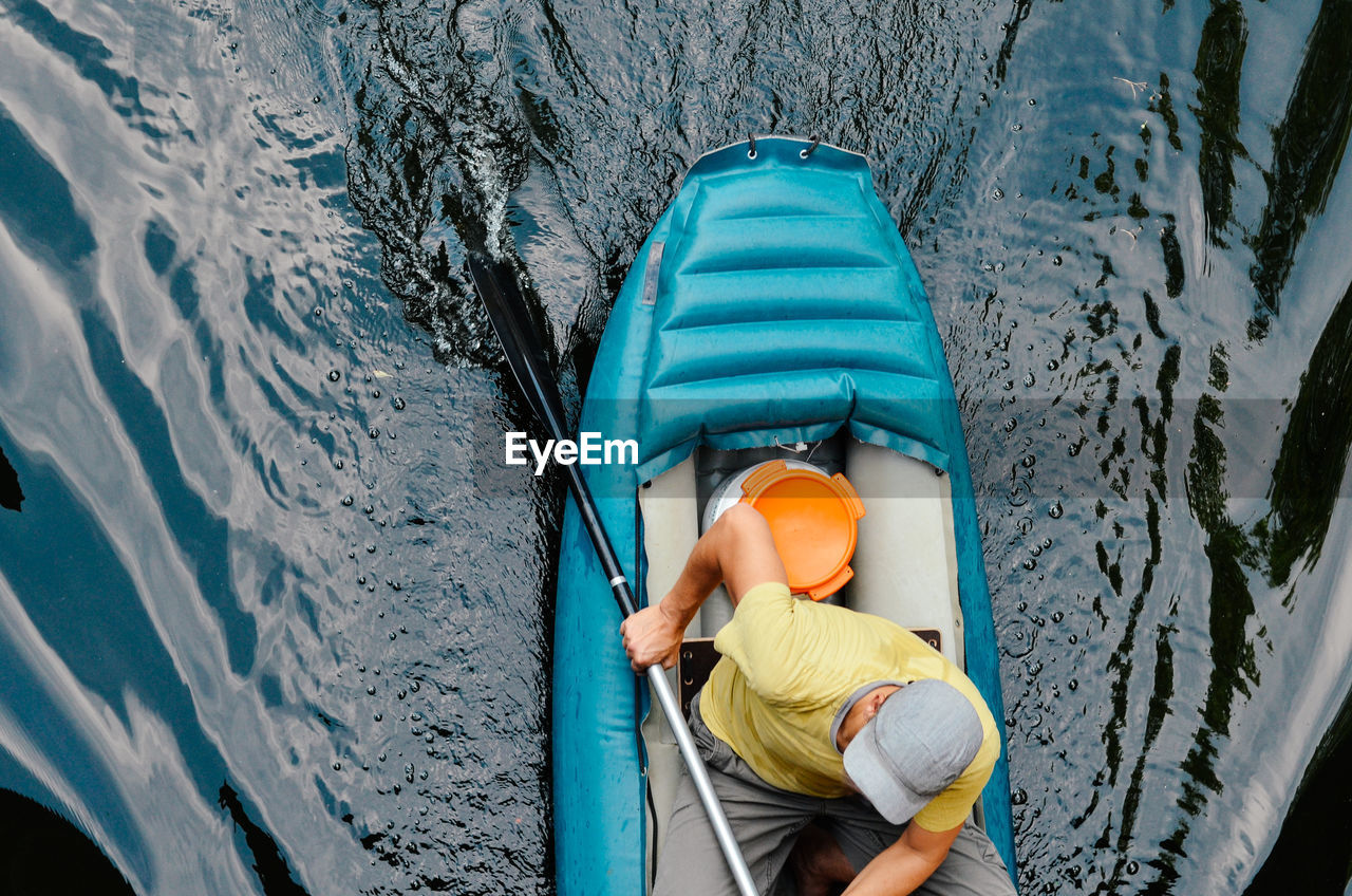High angle view of man in canoe