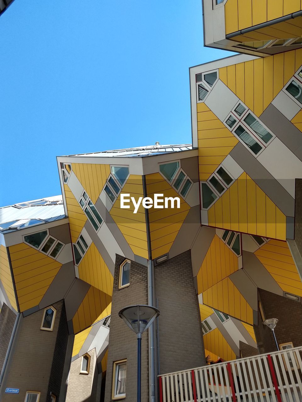 LOW ANGLE VIEW OF BUILDINGS AGAINST CLEAR SKY