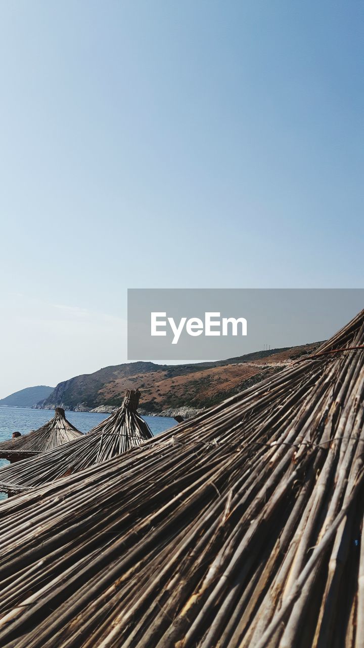 Scenic view of landscape against clear blue sky