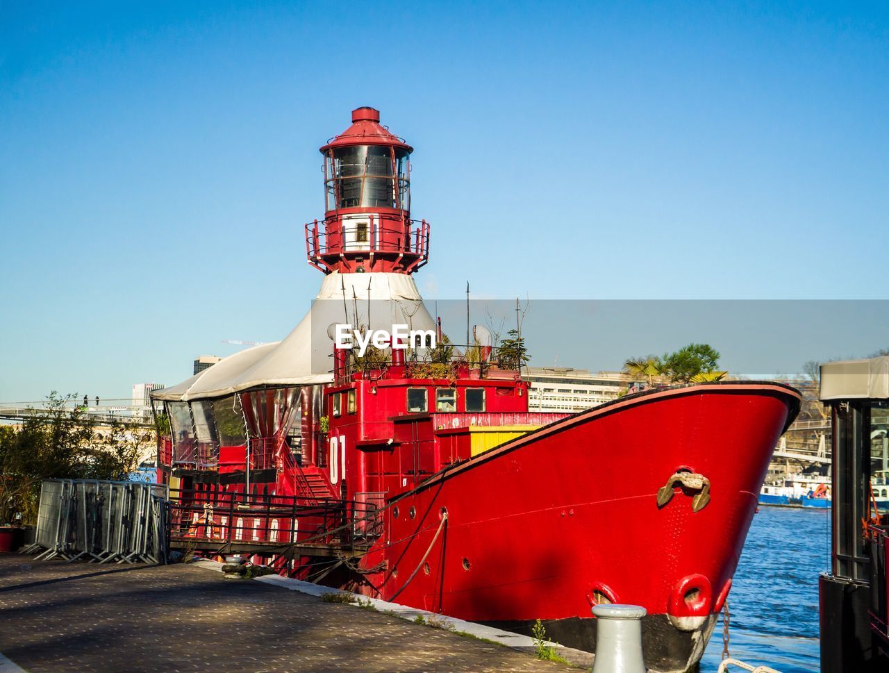 RED SHIP AGAINST CLEAR SKY