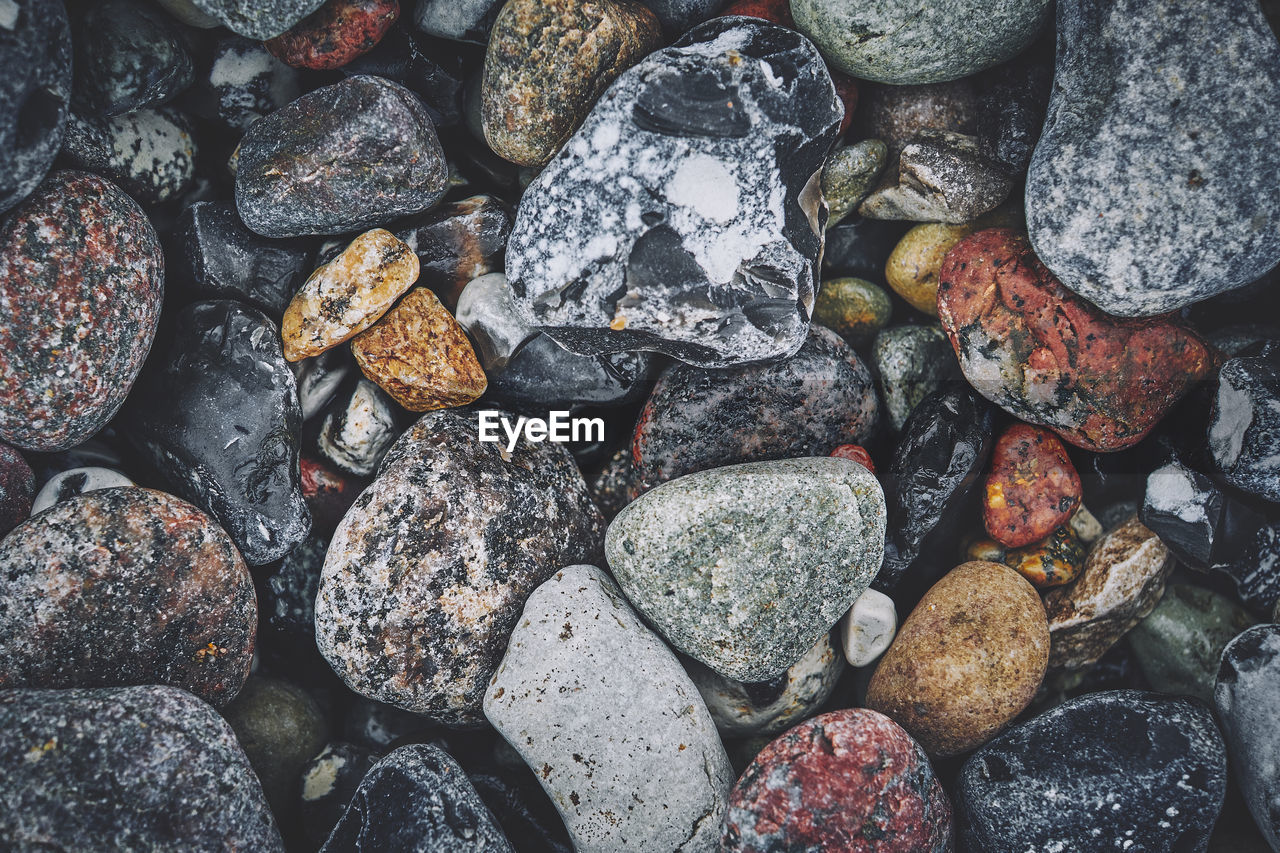 Full frame shot of wet pebbles