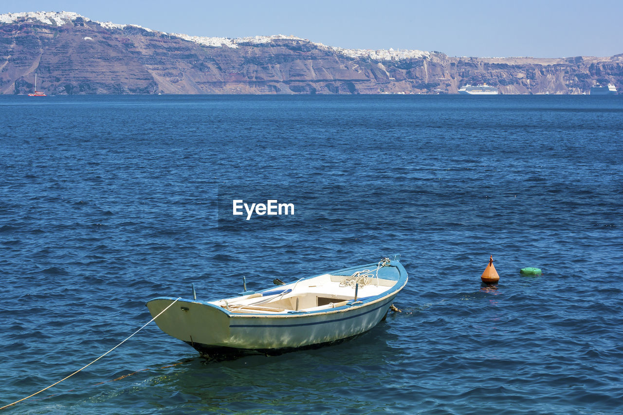 Nautical vessel on sea against sky