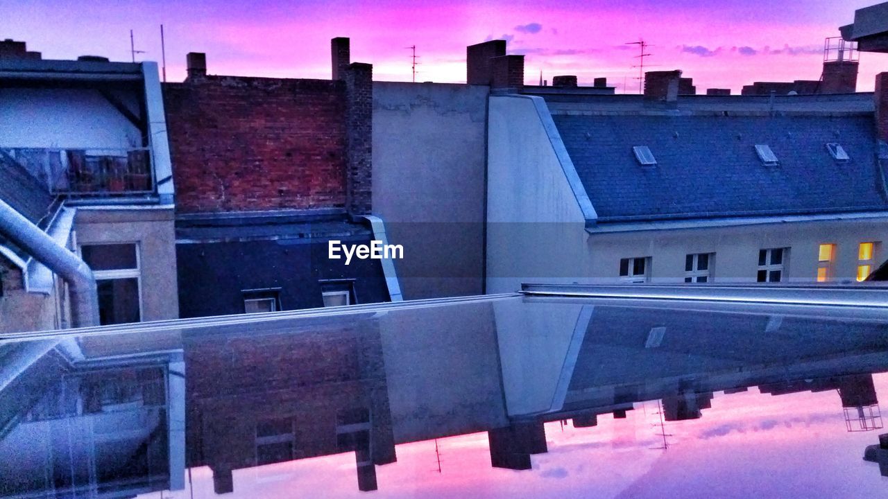 REFLECTION OF BUILDINGS IN WATER