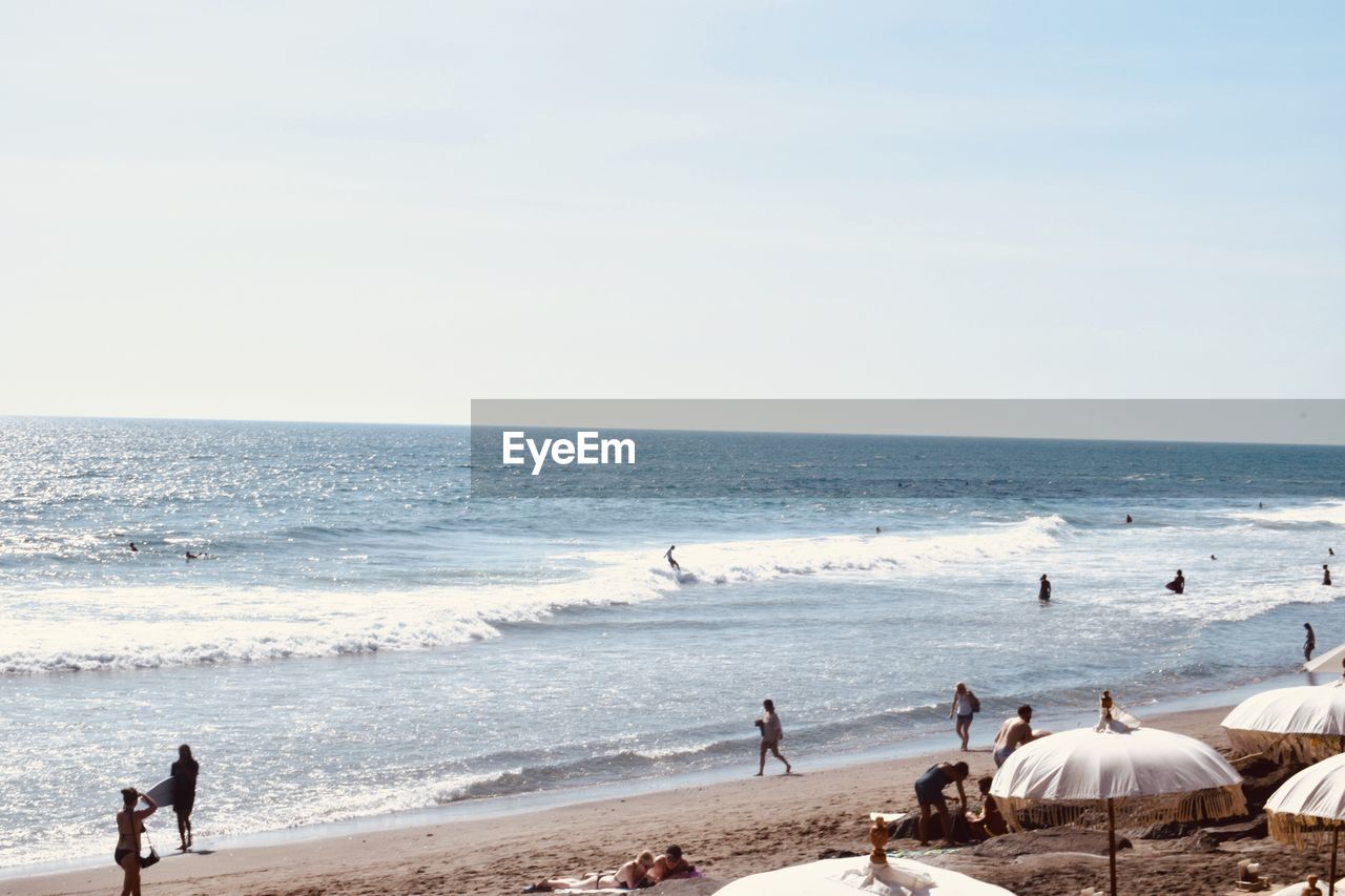 GROUP OF PEOPLE ON BEACH