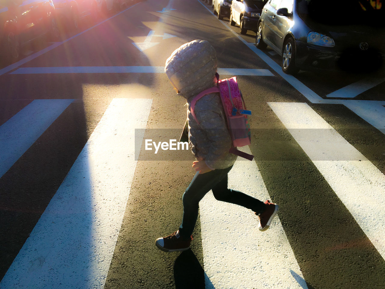 HIGH ANGLE VIEW OF GIRL WALKING OUTDOORS