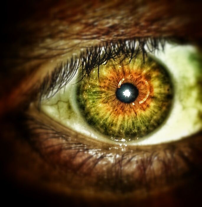 EXTREME CLOSE-UP OF HUMAN EYE