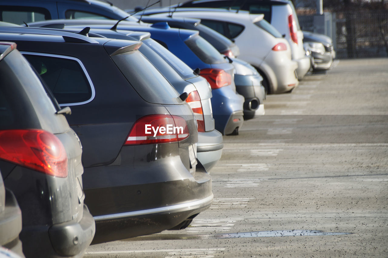 Cars parked on road in city