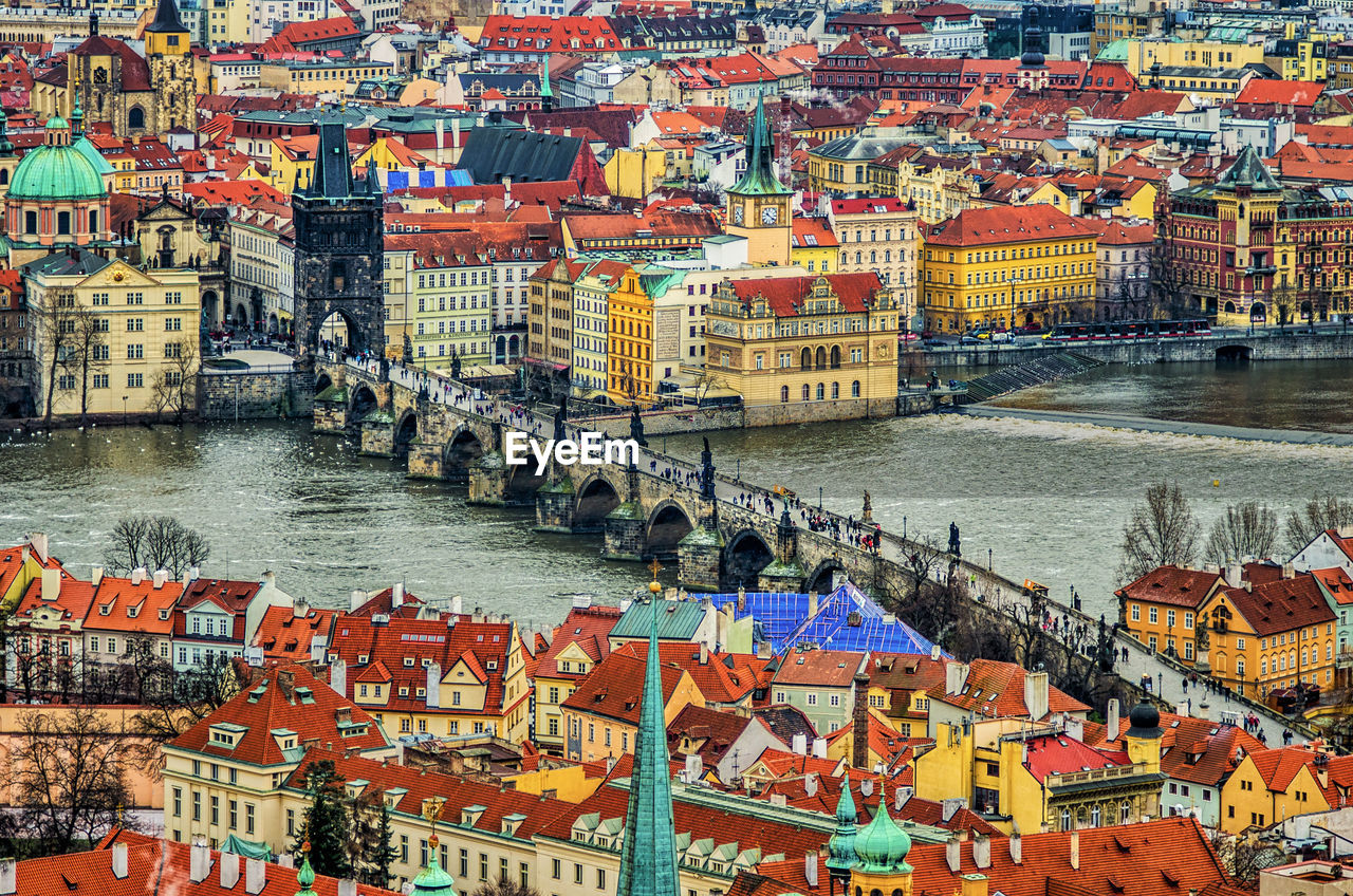 High angle view of charles bridge over vltava river in city