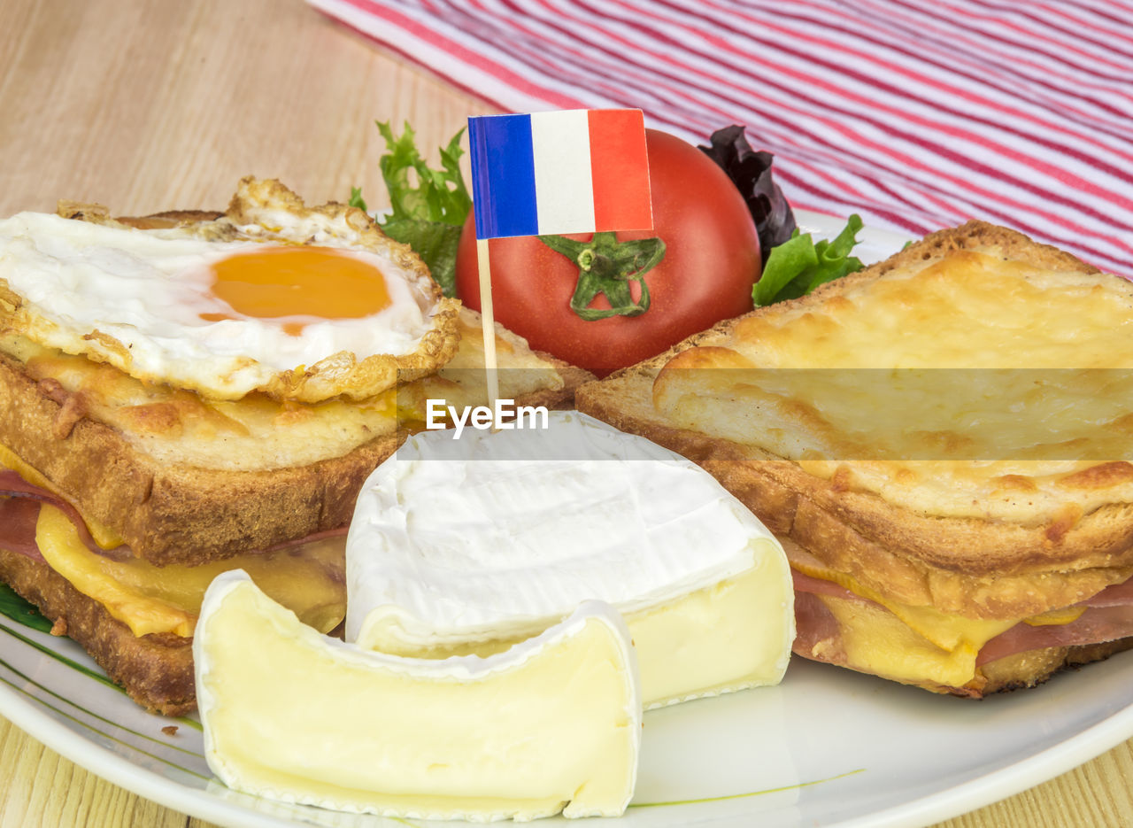 Close-up of croque madam and croque monsieur