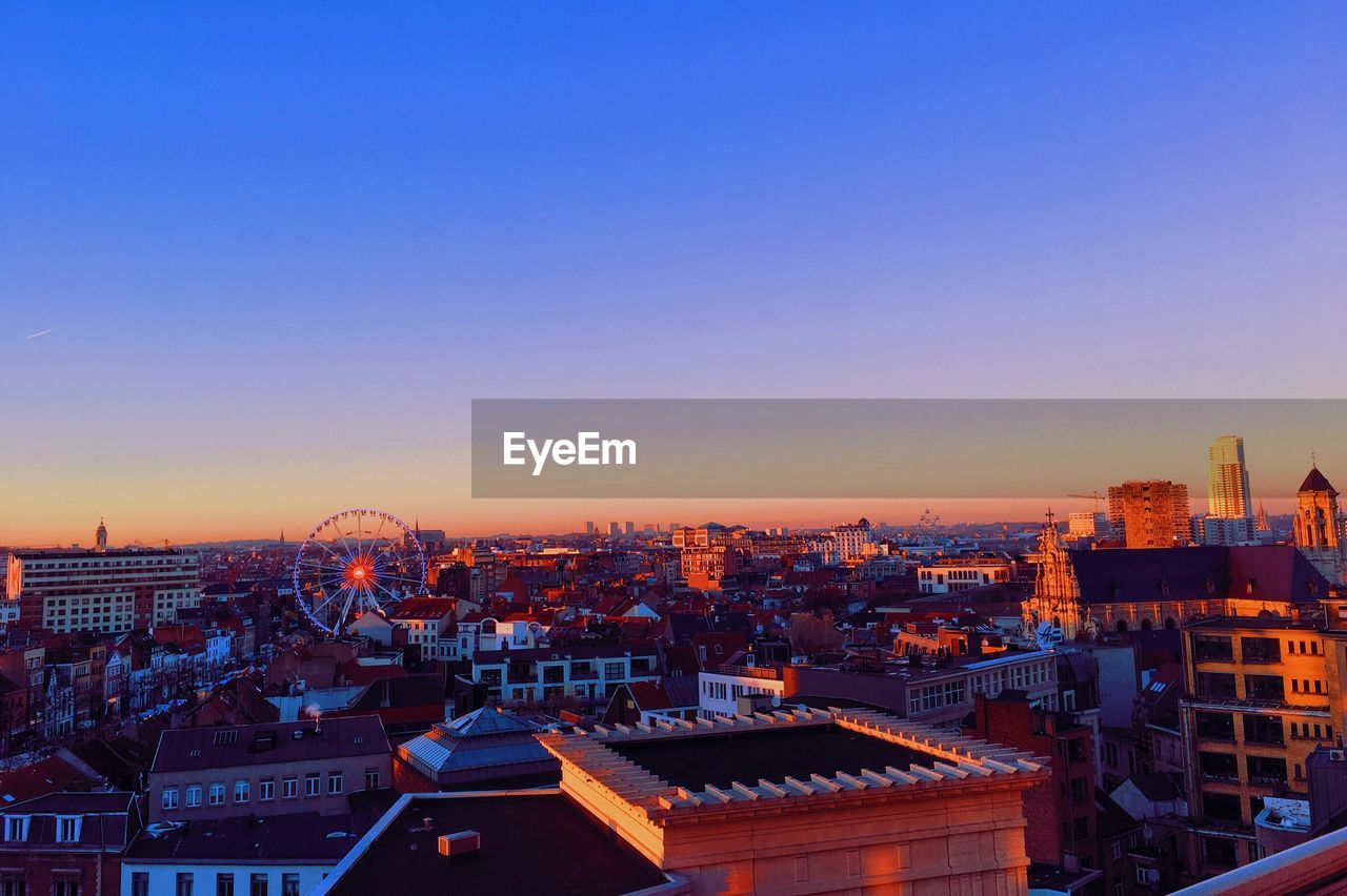 High angle view of city at dusk