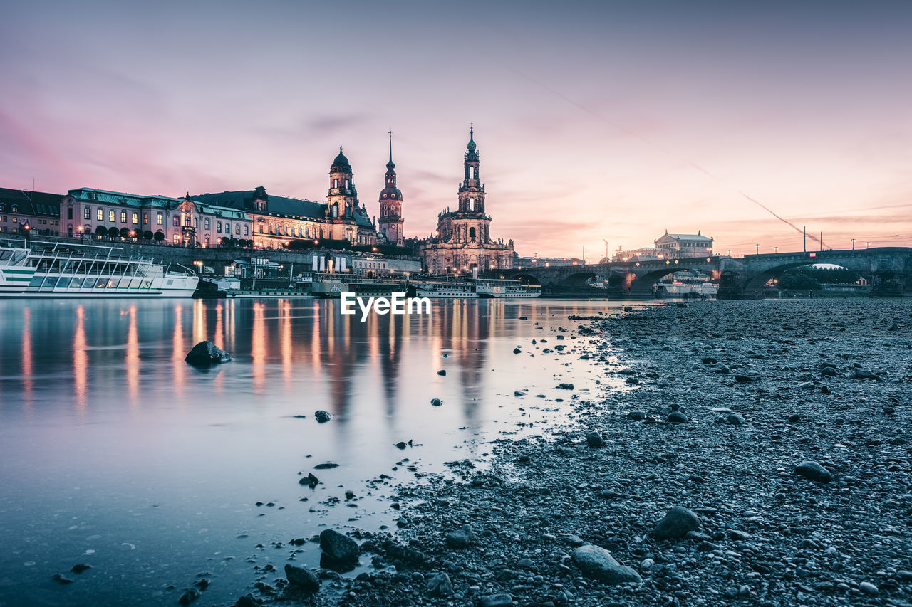 Elbe river with buildings reflection during sunset