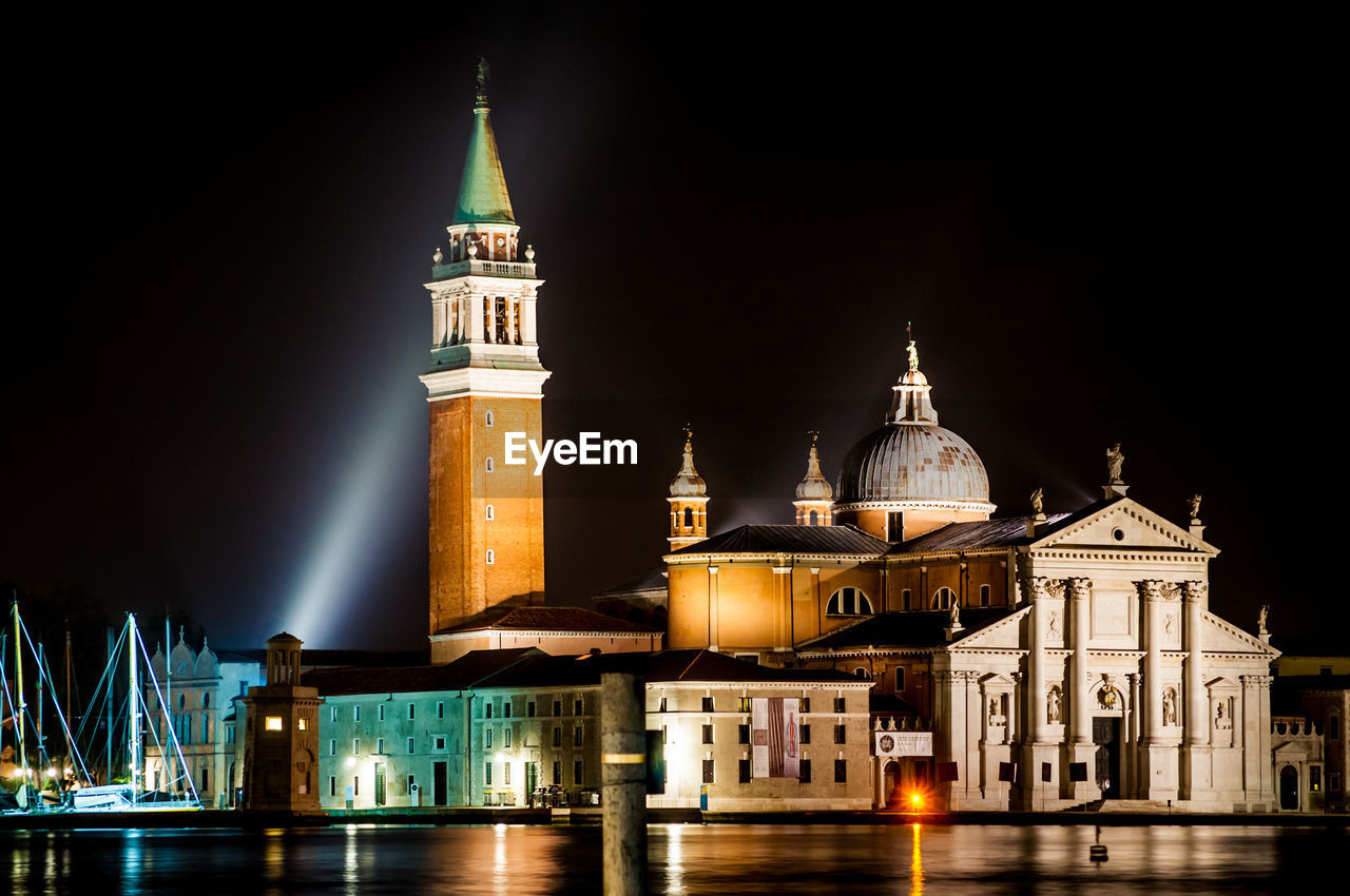 Illuminated building against sky at night venice with spotlights