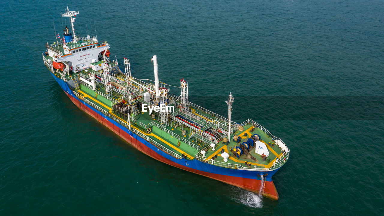 Aerial view oil and gas tanker petrochemical offshore in open sea, refinery industry cargo ship, 