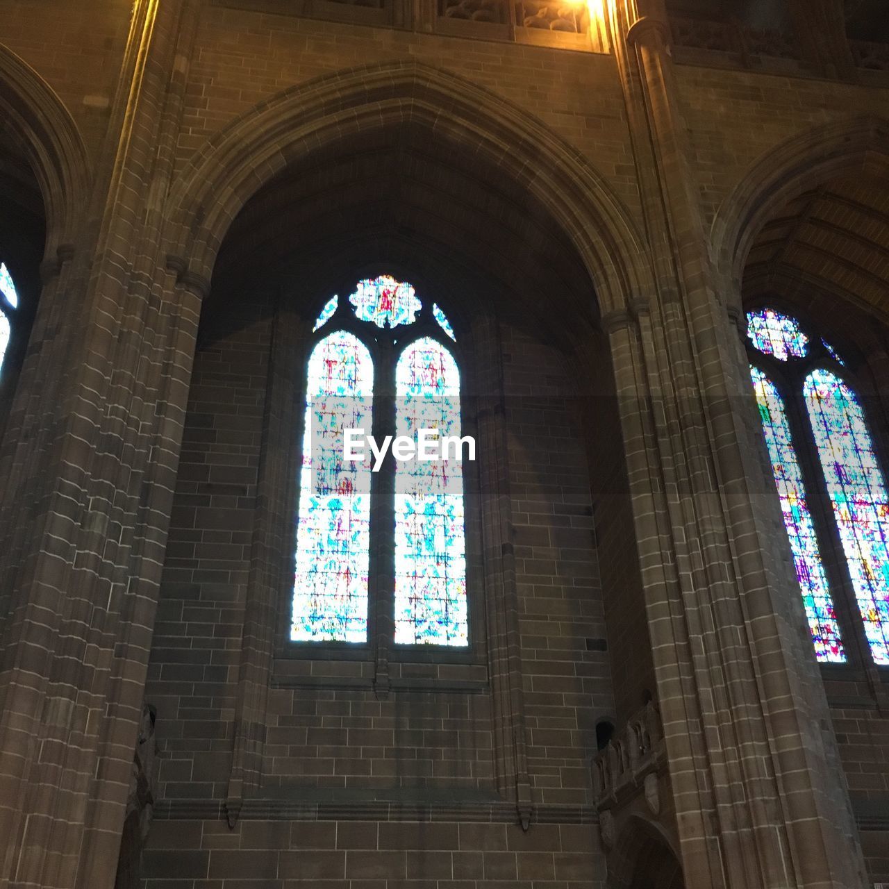 LOW ANGLE VIEW OF STAINED WINDOW