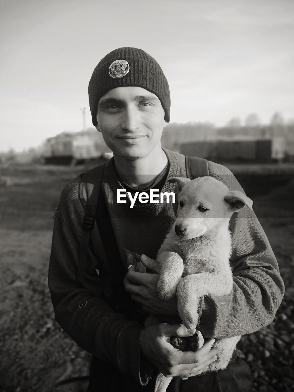 Portrait of smiling man with dog