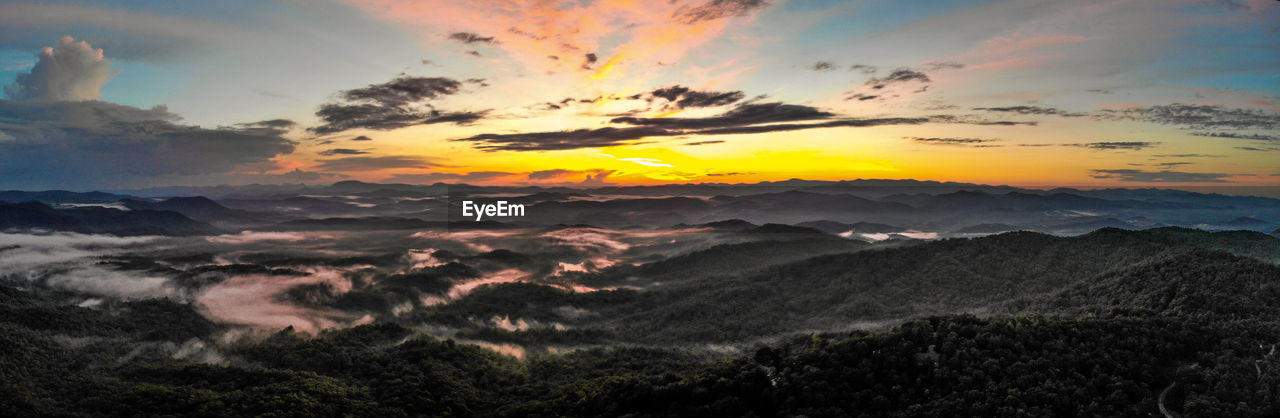 Scenic view of dramatic sky during sunset